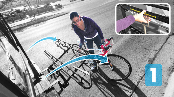 Cyclist lowering external bike rack