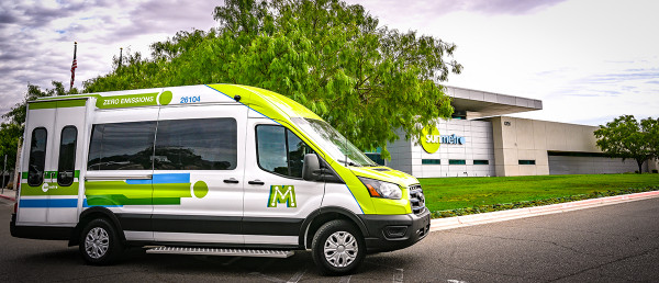 Microtransit van in front of Sun Metro Transit Operations Center
